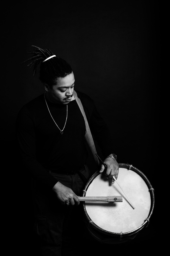 man holding drum in his hands