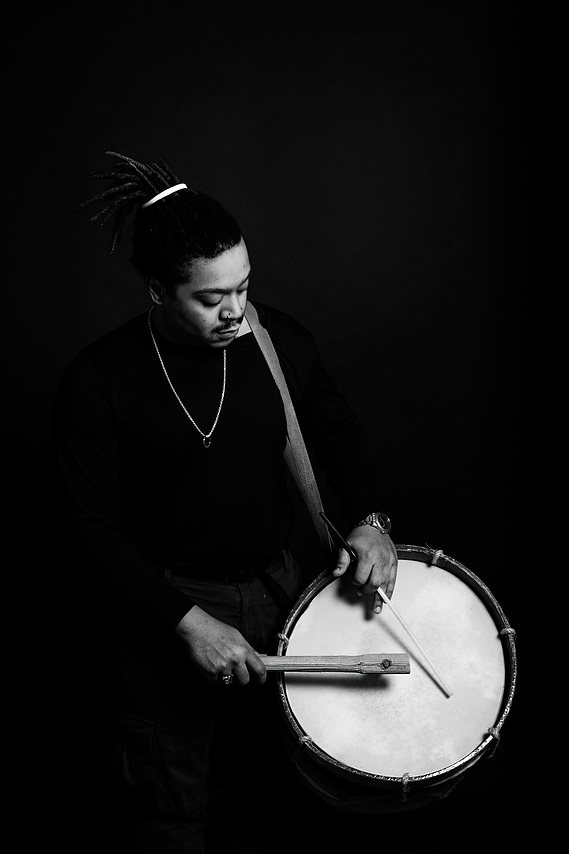 man holding drum in his hands