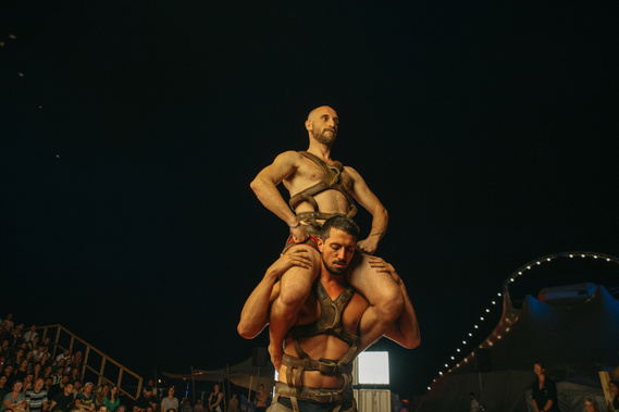 a man with another man on his shoulders