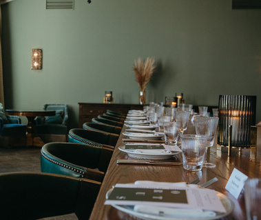 dining table with cutlery and crystal glasses