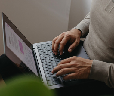 hands on a computer keyboard