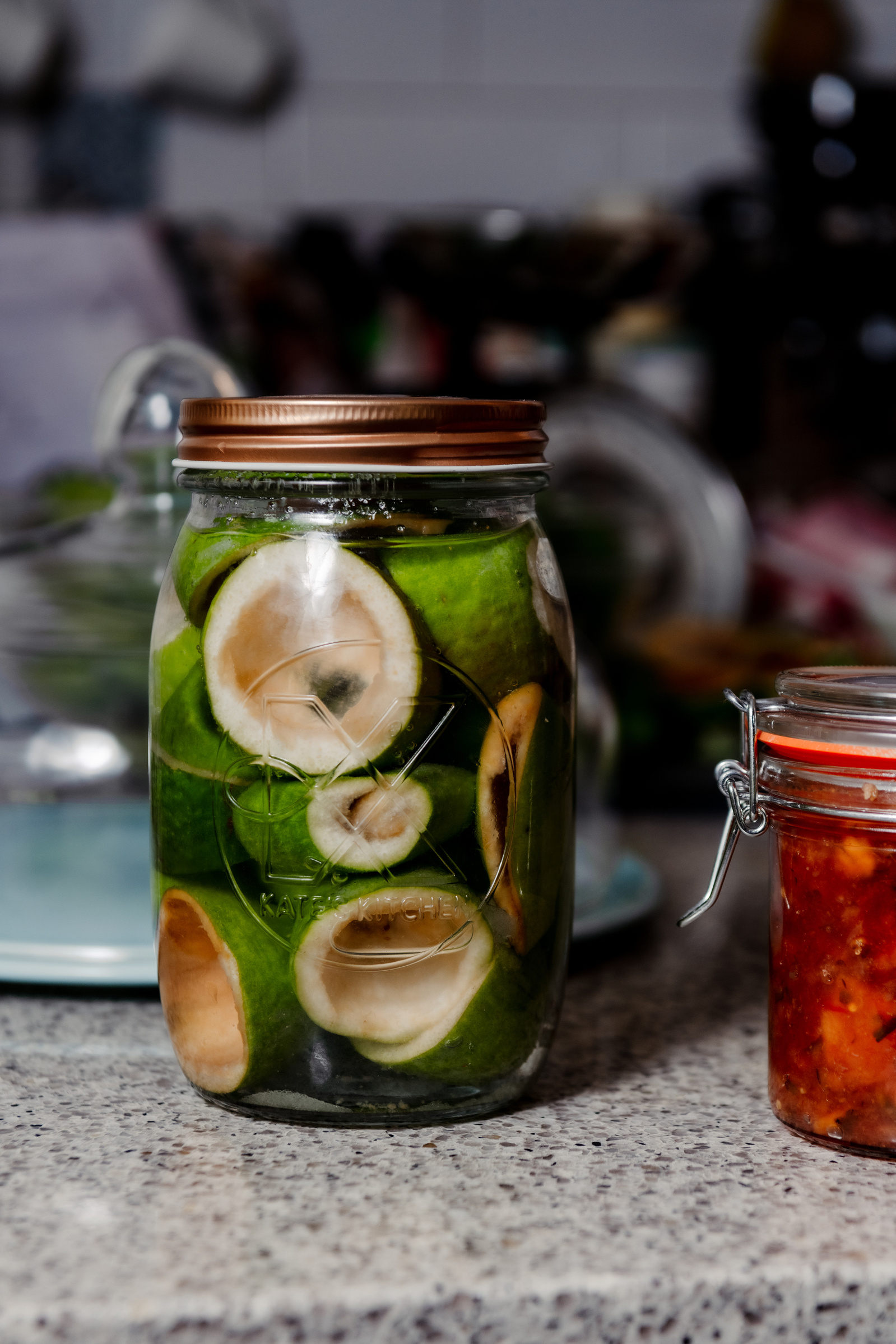 Ines Crawford prepares Feijoa Fizz for fermentation at her home in Nelson New Zealand on Saturday, April 6, 2024. In New Zealand, the arrival of fall is marked by the distinctive flavor of feijoas, a beloved national fruit that fosters comm unity and shar