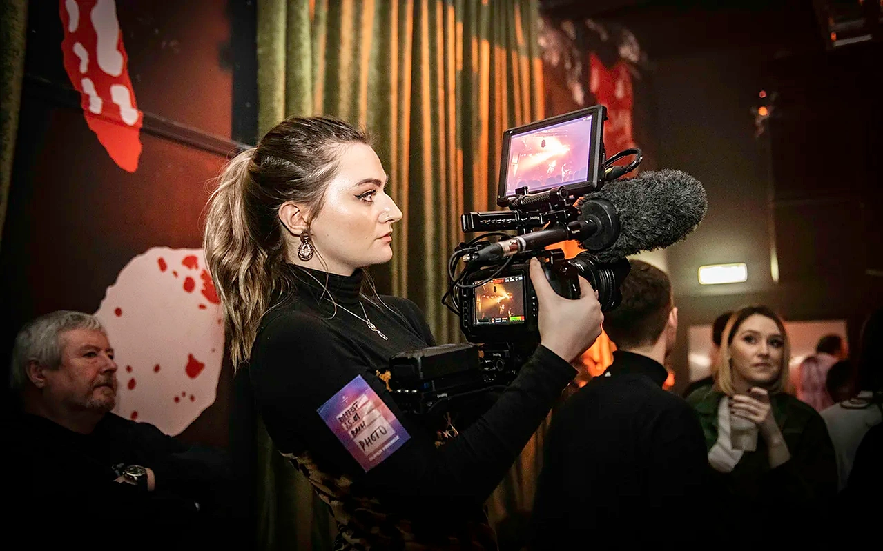 cool indie girl videographer using BMPC4K camera at Belgrave Music Hall photographed by Mark Wheelwright from Aire Street Studios Leeds