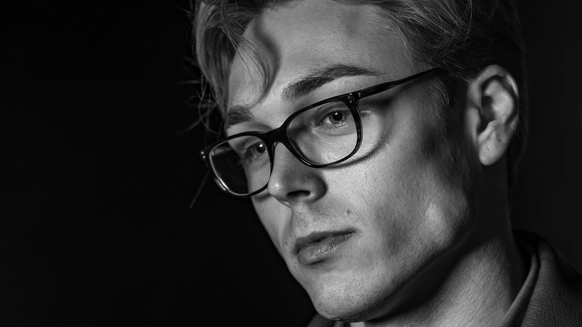 Actor Headshot and male model in noir black and white good cheekbones and facial structure