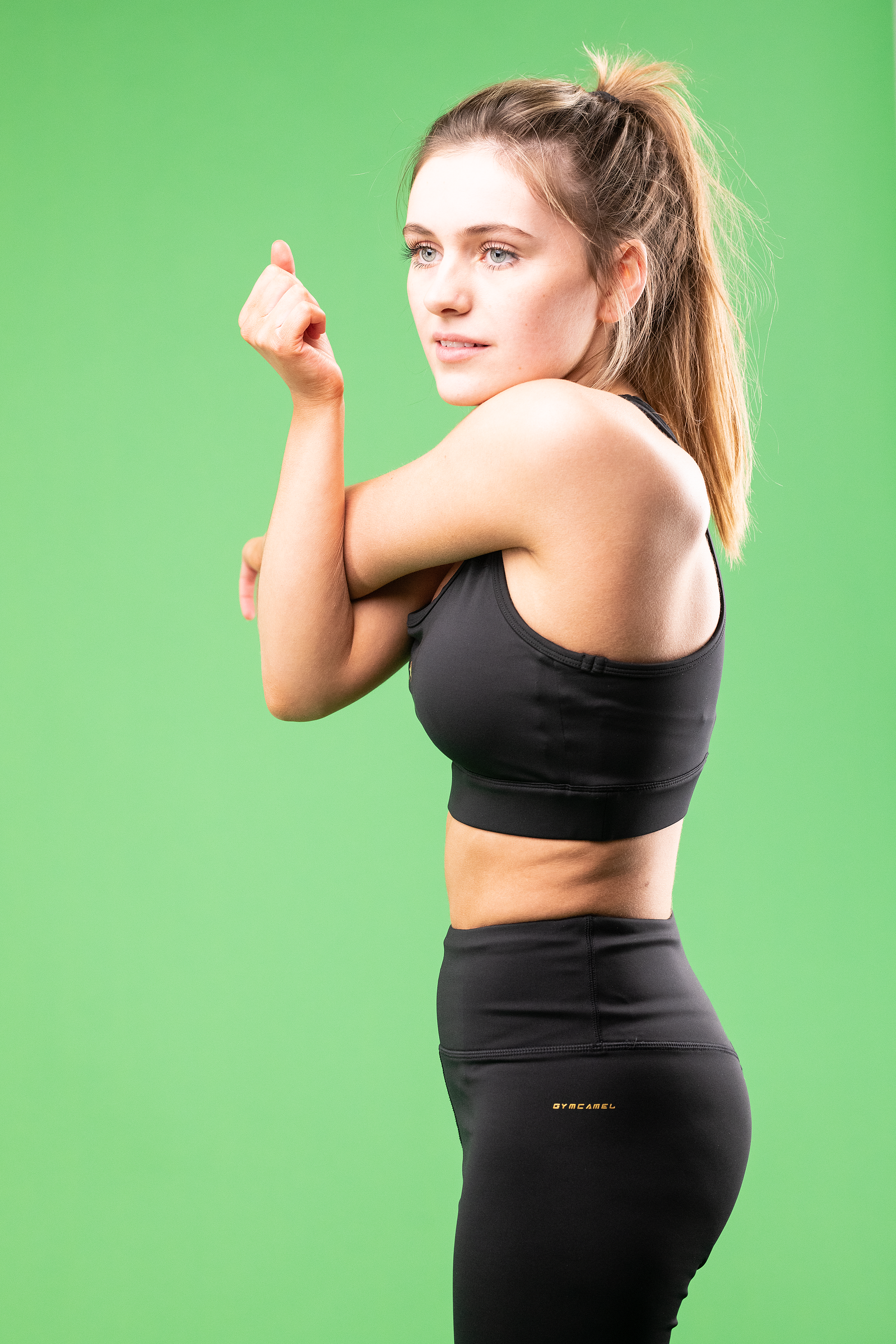 gym girl on green screen e-commerce shoot