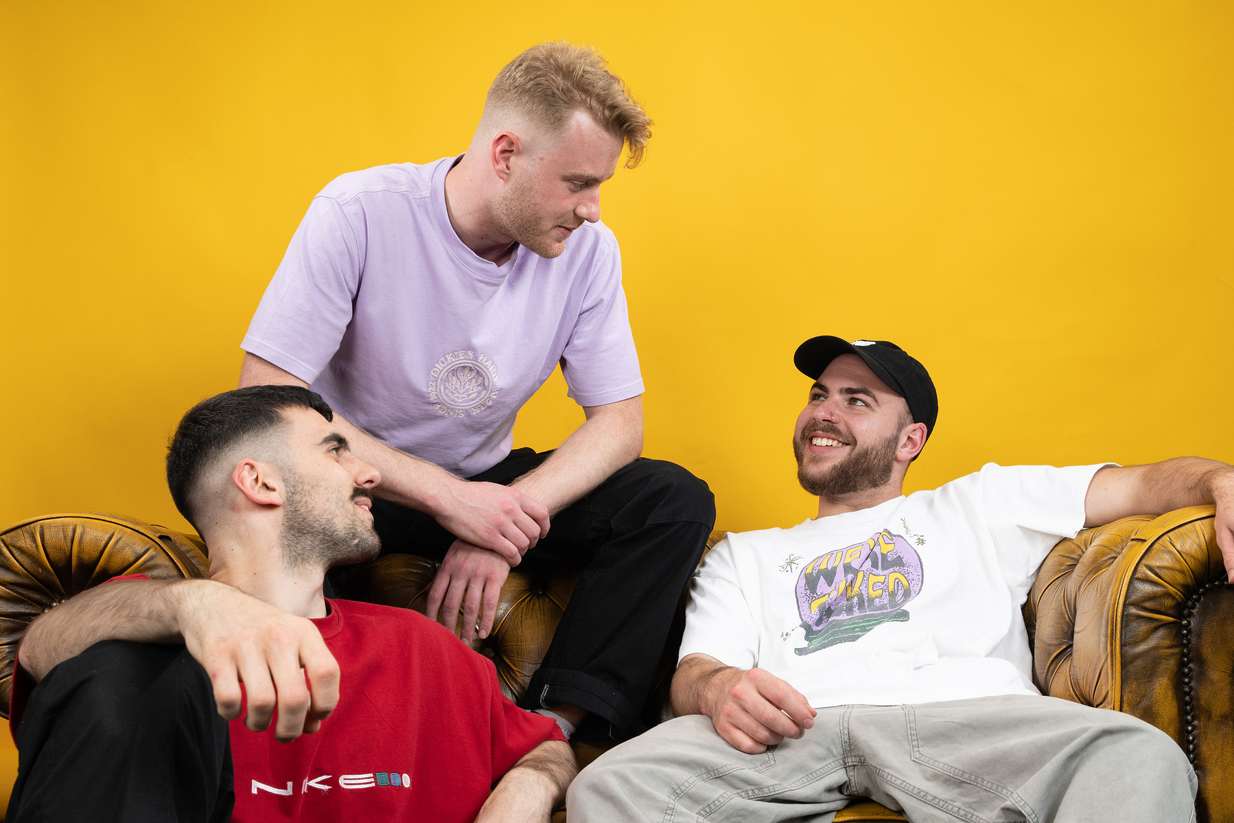 Band photoshoot on yellow colorama background photographed by Mark Wheelwright from Aire Street Studios Leeds