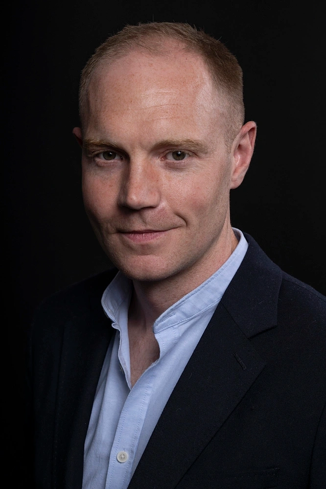 Business headshots photograph of man photographed by Mark Wheelwright from Aire Street Studios Leeds