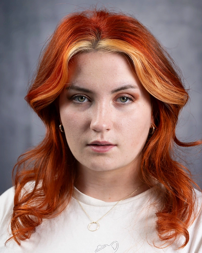 Female actor with red hair photographed by Mark Wheelwright from Aire Street Studios Leeds