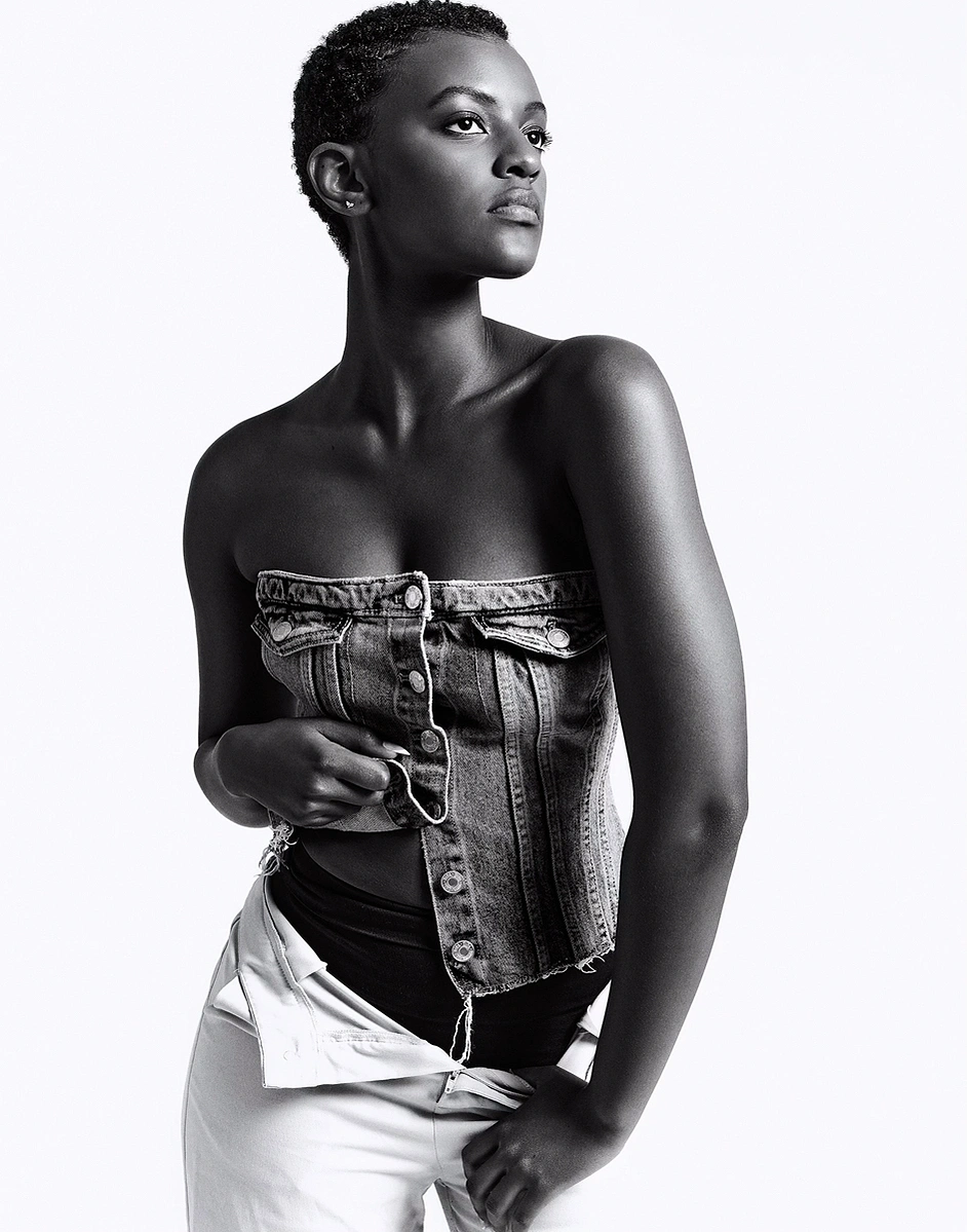 Monochrome image of black female model with flawless skin tone captured on a photo studio hire at Aire Street Studio Leeds