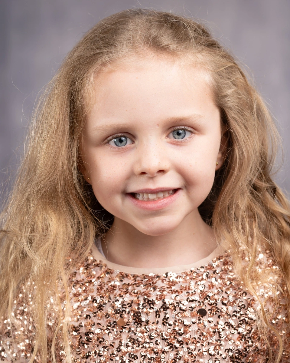 young child actor headshot, blonde girl 