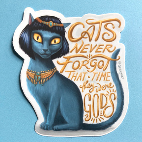 Cats Never Forgot That Time They Were Gods
Vinyl sticker featuring a black Egyptian Cleopatra cat with the hand lettered text 