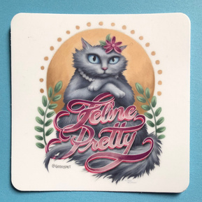 Feline Pretty
Vinyl sticker featuring a grey long haired cat with the hand lettered text 