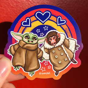 Ikea Monkey and Small Green Alien
Magnet featuring the IKEA Monkey of Toronto fame holding hands with a cute green alien surrounded by hearts, stars and a rainbow
