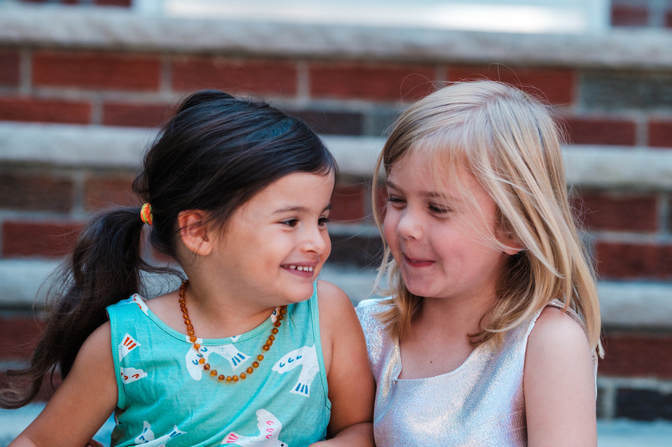 Two little girls on stoop