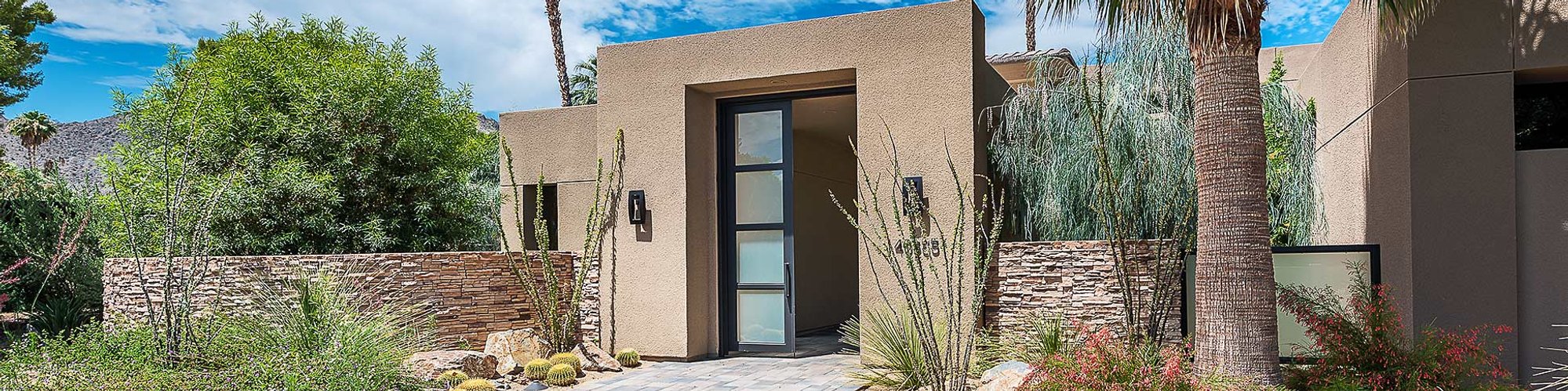 Entry doors of a new modern, contemporary home in Rancho Mirages' Thunderbird Terrace, one a several communities within the Historic Thunderbird Country Club. 