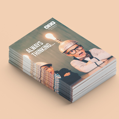 ASP Promotions 2023/24 Catalogue Front Cover. Image of boys sitting at table with arms crossed wearing metal helmets with lightbulbs on top. Page title Always Thinking...