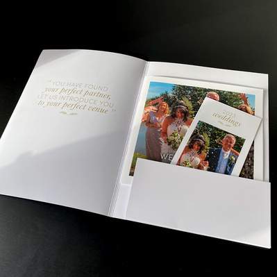 Wedding Folder Open showing the brochure and leaflet inserted