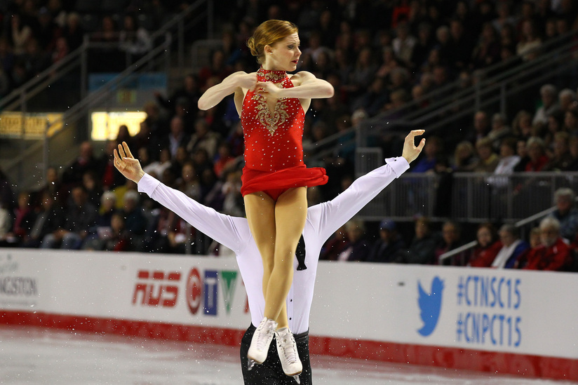 Natasha Purich is thrown by her partner, Drew Wolfe, during their free program in the pairs competition at the Canadian Figure Skating Championships on Saturday, Jan. 24, 2015, in Kingston, Ontario.