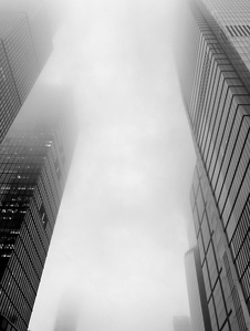 Scrapers disappearing in the fog. Hudson Yards, New York City. B&w photography of architecture.
