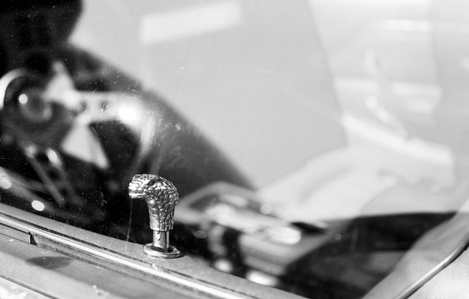 Mustang car show. B&w photography. Ford Mustang Shelby cobra door lock detail.