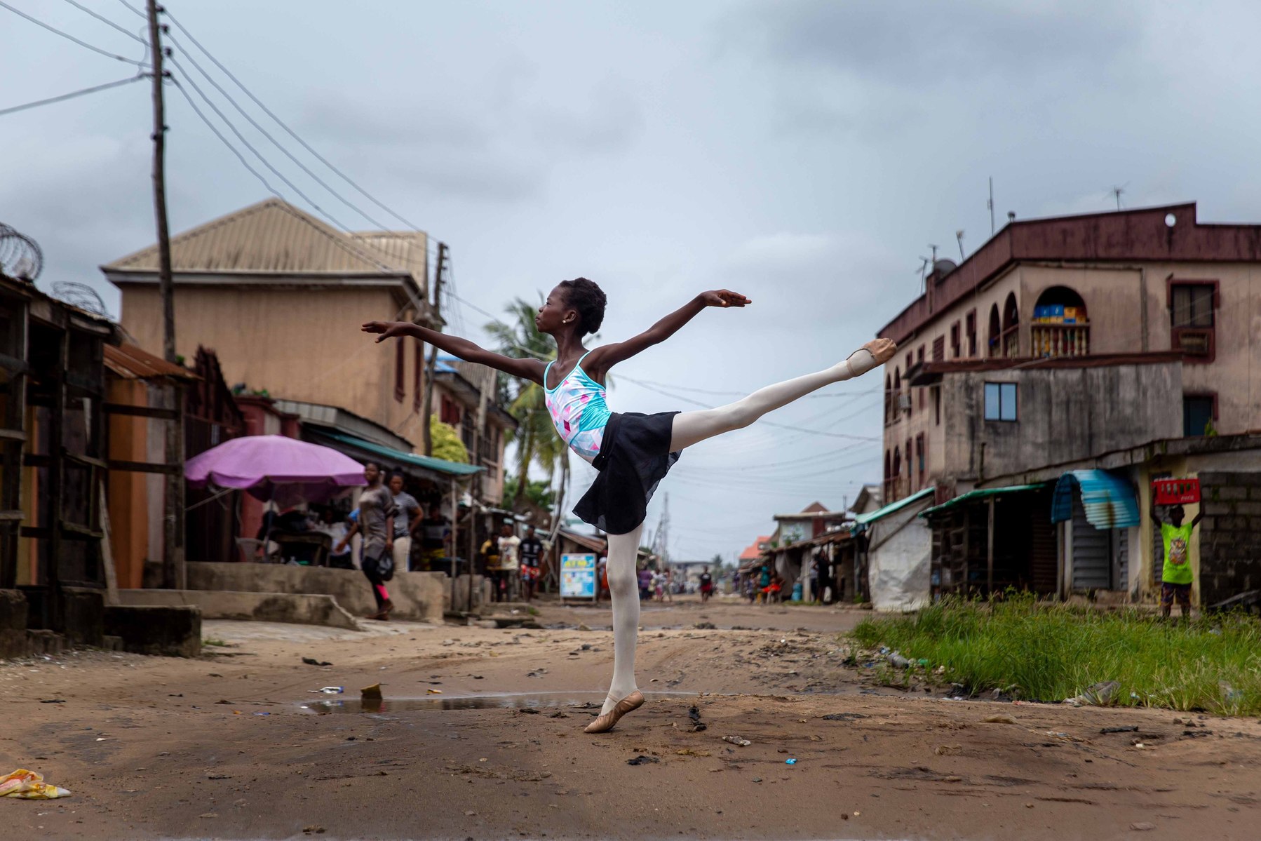 A student of the Leap of Dance Academy, Precious Duru performing a dance routine at Okelola street Ajangbadi, in Lagos on July 3, 2020. Leap of Dance Academy is a ballet dance academy focused on empowering young talents who are willing to learn ballet d