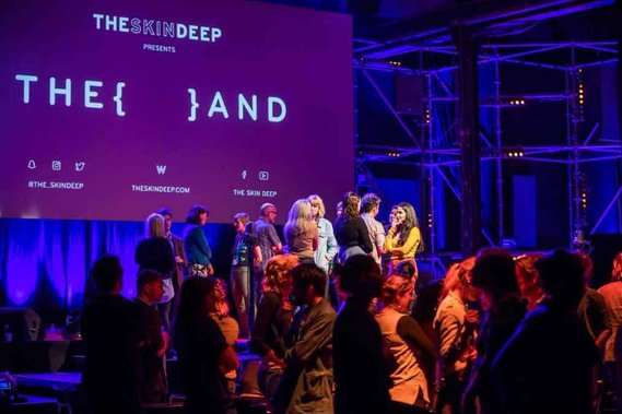Pairs of strangers speak to one another on {THE AND} live stage.
