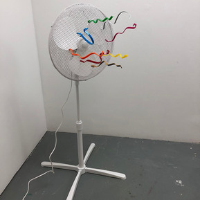 Acrylic ribbons attached to an oscillating  fan