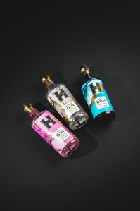 Hardakers X Scott Uzoho -- product still-life photography of Gin Whiskey Vodka Rum on black background 