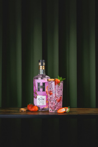Hardakers  X Scott Uzoho -- product still-life photography of berry flavoured gin and cocktail infront of draped emerald green curtain 