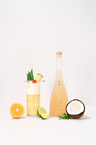 Uche Rum X Scott Uzoho -- product still-life photography of Rum Pina Colada coconut and pineapple garnish 