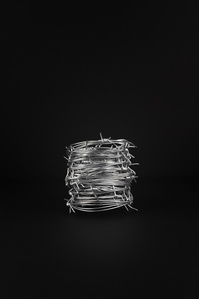 Barb Wire X Scott Uzoho -- product still-life photography of Contrast Jewellery on black background