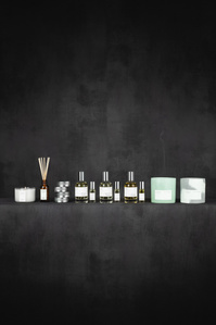 Project Coax X Scott Uzoho -- product still-life photography of perfume aftershave candles and incense diffuser on concrete skims set 