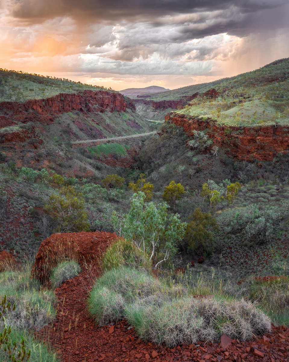 Spinifex covered hillsides line the edge of Munjina Gorge.