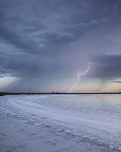 Lightning strikes behind a salt pan in Western Australia.