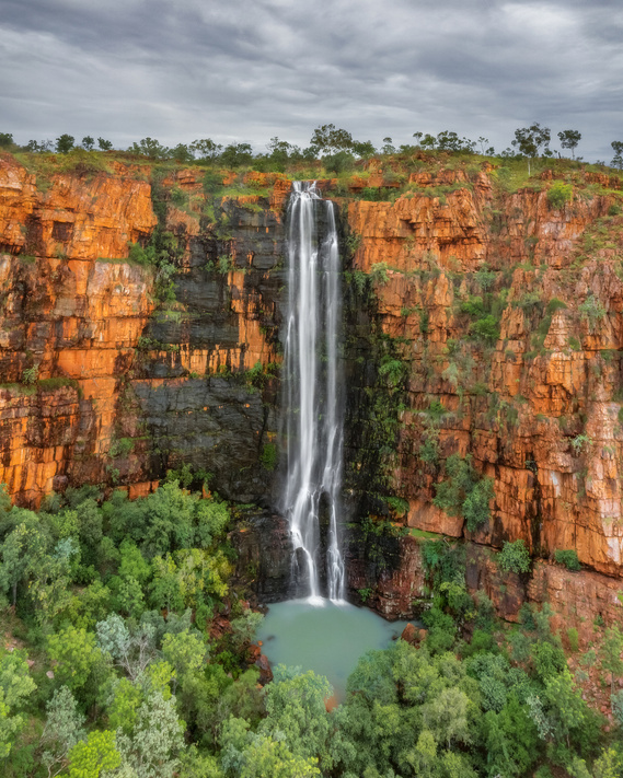 A large waterfall drops vertically for 70 metres before reaching the pool below.