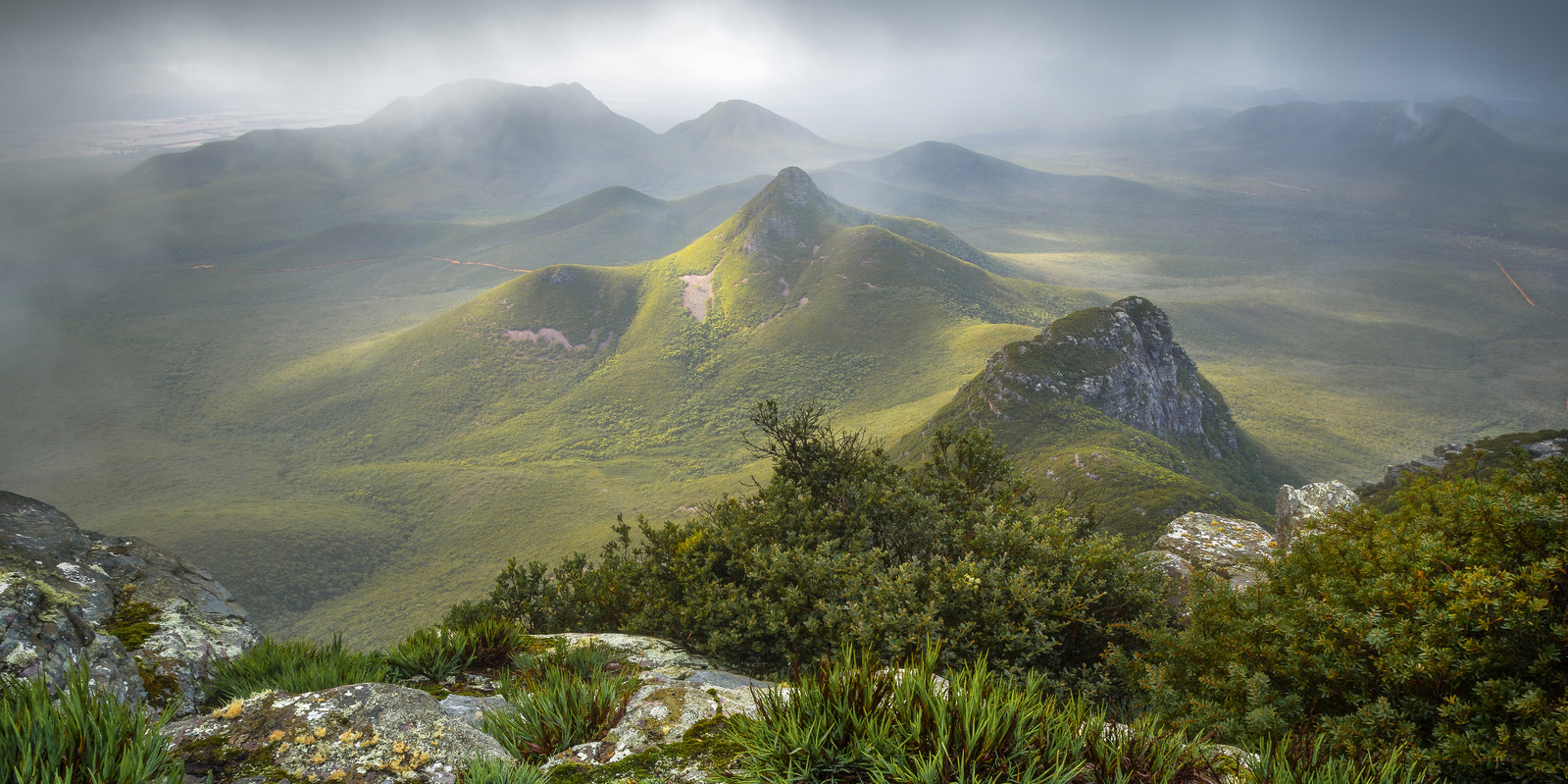 Panoramic view from Mount Toolbrunup. A tall peak in the Stirling Range National Park.