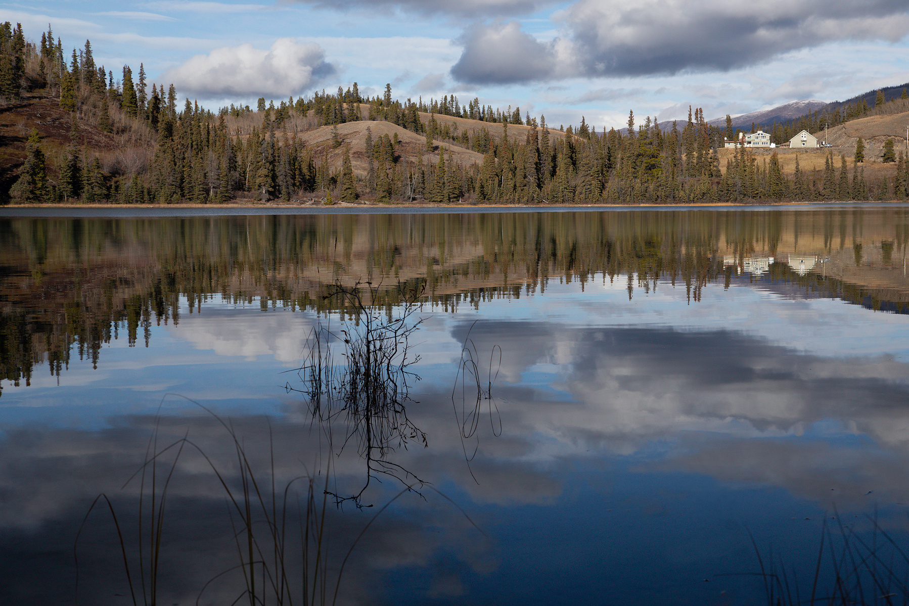The still waters of Emerald Lake in the Yukon on an October afternoon.