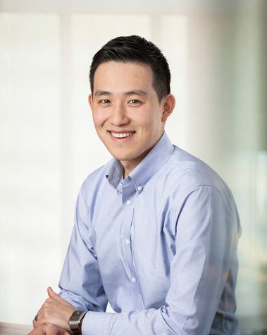 Portrait of an asian man in an investment firm