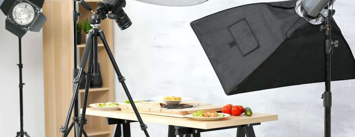 Charlottesville food photography studio with camera, styled food items, and other professional photo equipment