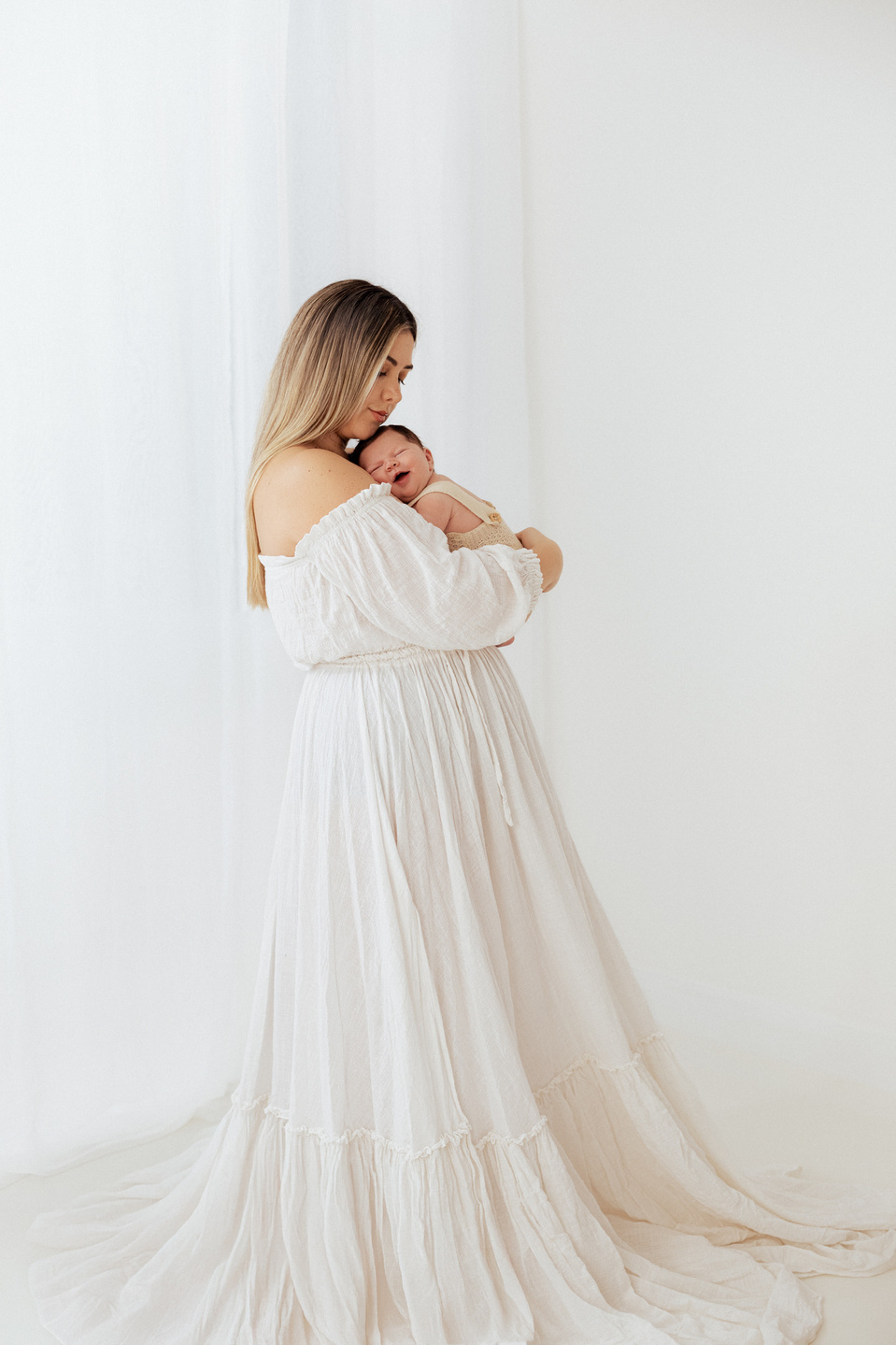 Newborn photography mother and baby wardrobe styling in london