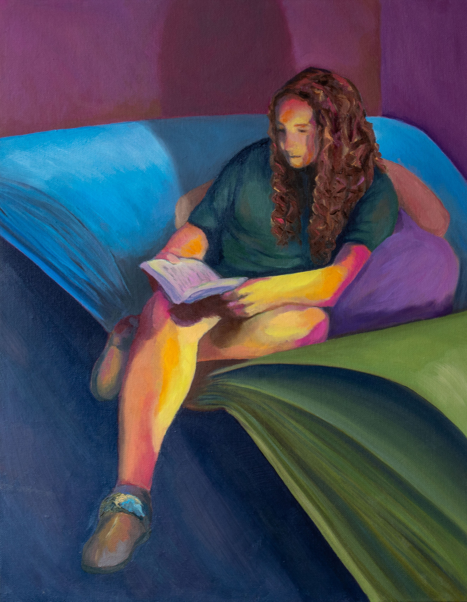 Figure with crossed legs reads from a book while sitting in the spine of a large book