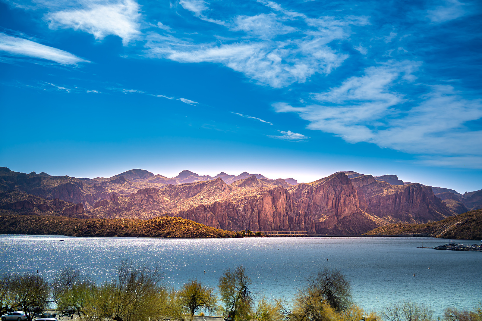Panoramic view of Saguaro Lake with desert mountains in the distance, perfect for Arizona nature photography.