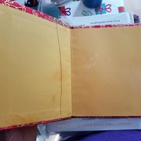 Inside front cover of the book, showing a large wrinke down the yellow end paper on one side.