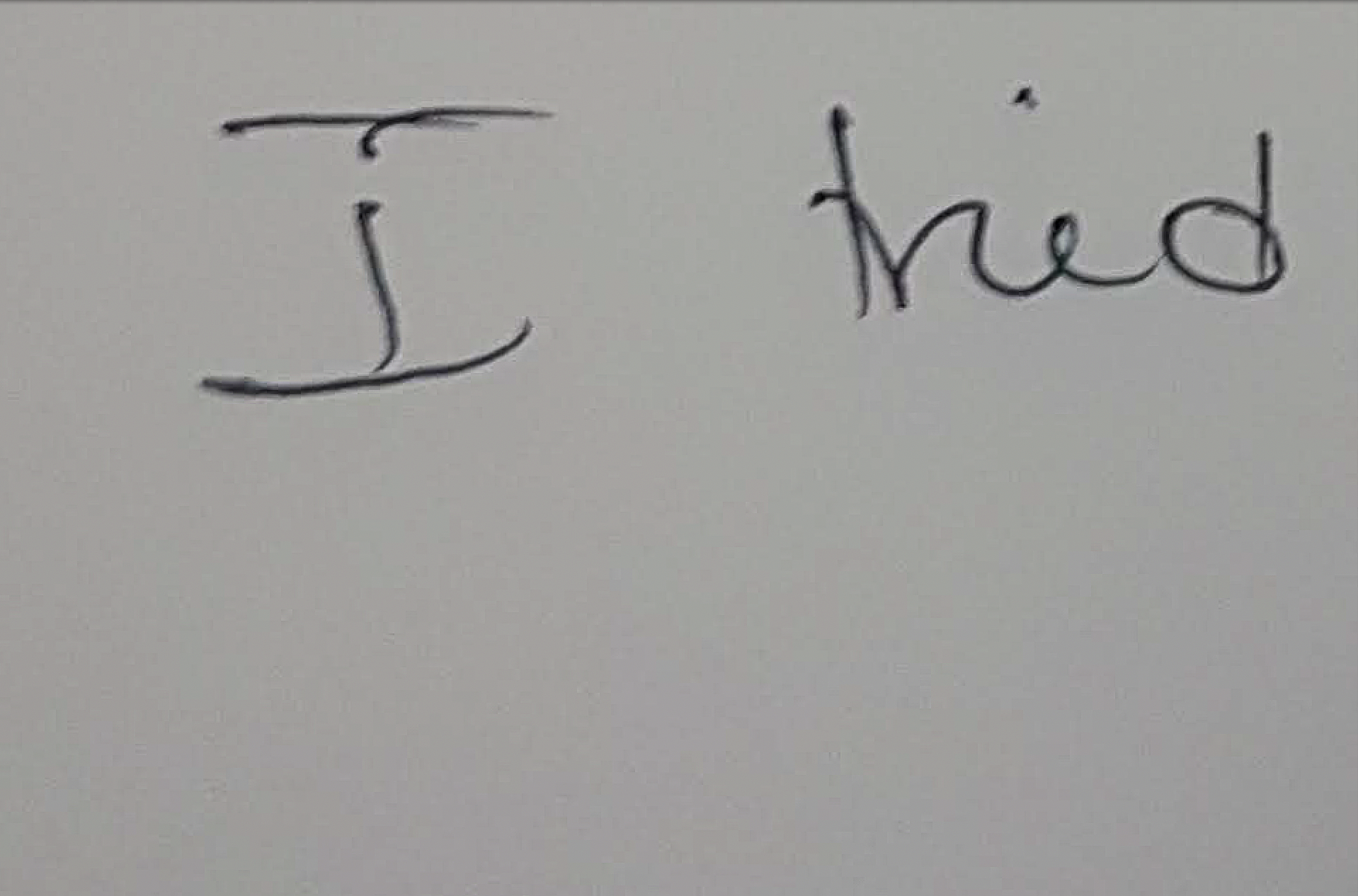 snippet from a handwritten note that just reads "I tried"