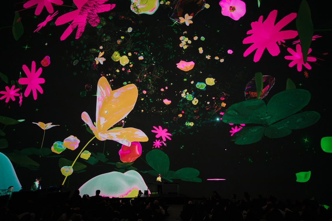 Diana Lynn VanderMeulen immersive dome artwork. MUTEK x SAT 2023. Society for arts and technology. Musical performance by Stefana Fratila. Cosmic formations, Plants, 3D artwork. Made with Unity. XR AR VR. 