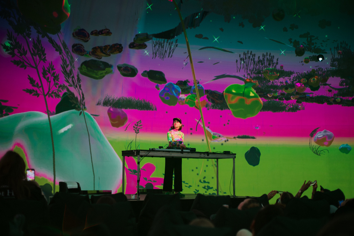 Diana Lynn VanderMeulen immersive dome artwork. MUTEK x SAT 2023. Society for arts and technology. Musical performance by Stefana Fratila. Cosmic formations, Plants, 3D artwork. Made with Unity. XR AR VR. 