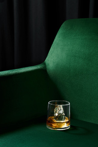 simple wiskey drink in a couch