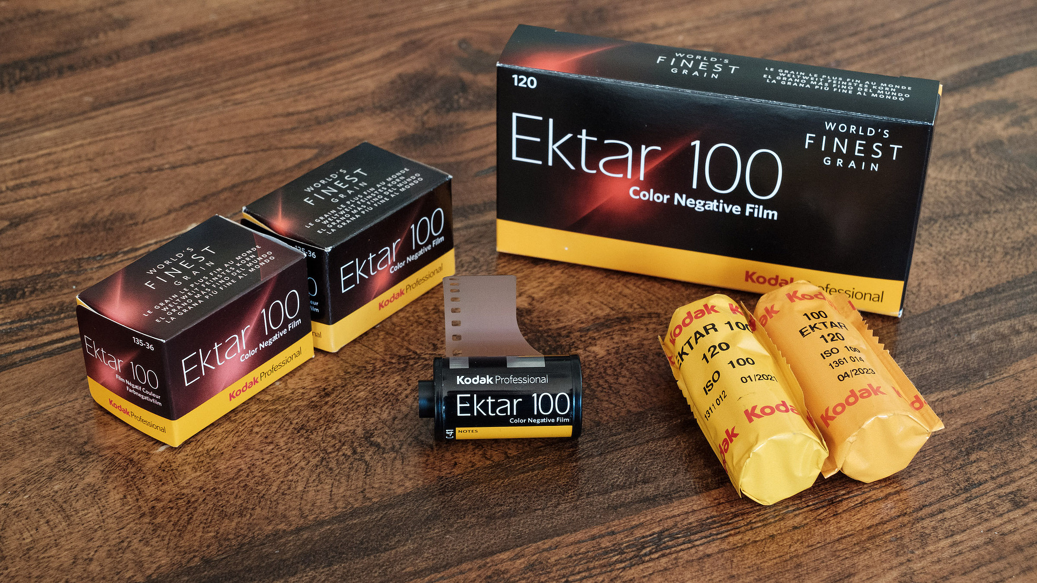 Kodak Ektar 100 boxes and film rolls in 35mm and 120 formats.