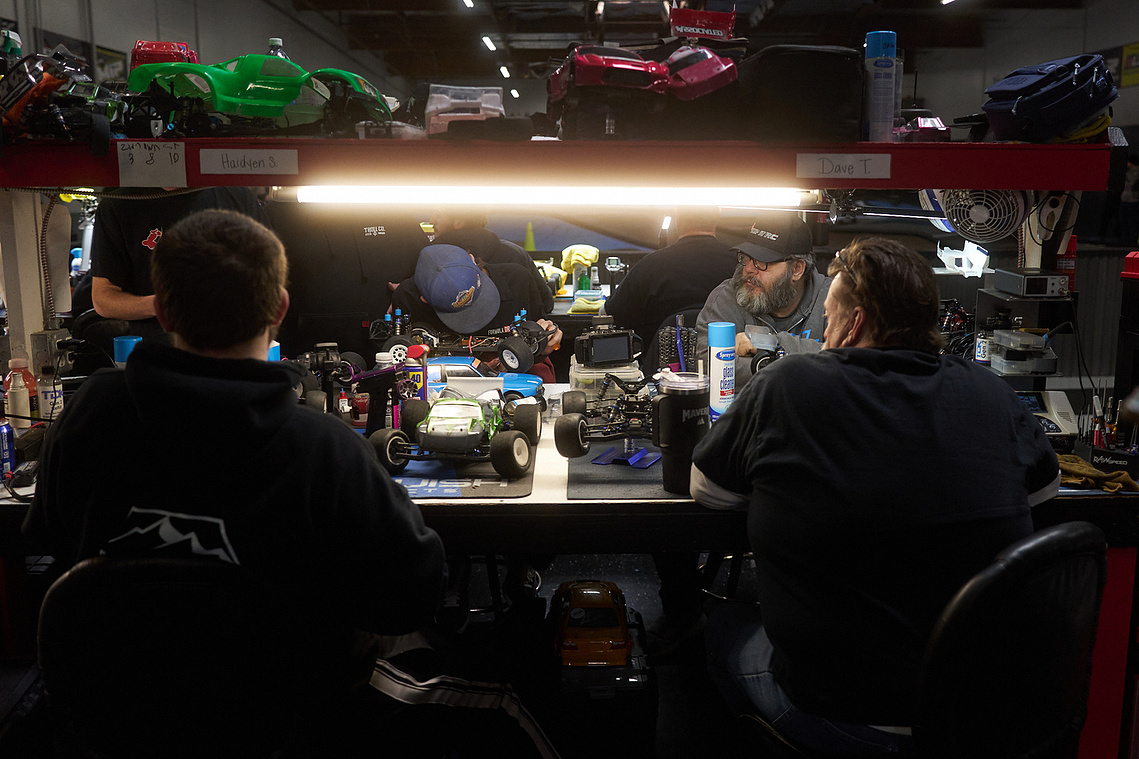 Drivers work on their RC cars at their pit stations inside Whip It RC Raceway & Hobbies in Reno, NV.