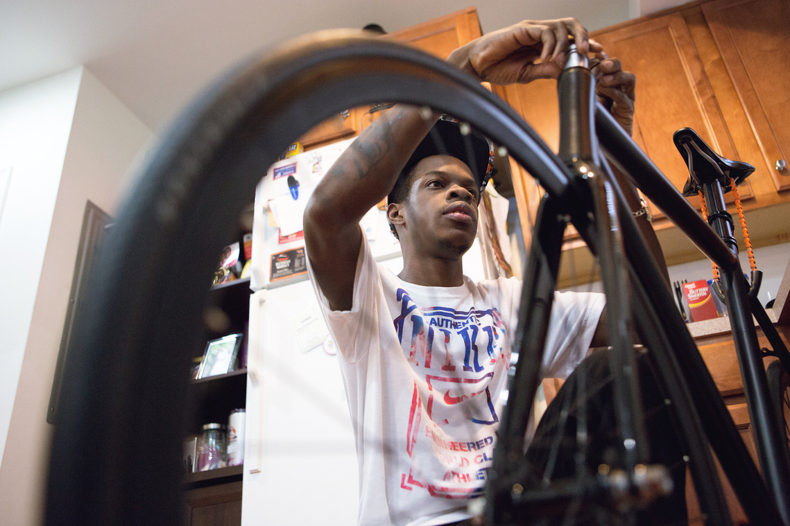 Bike messenger builds a bike inside his home in Washington, DC.